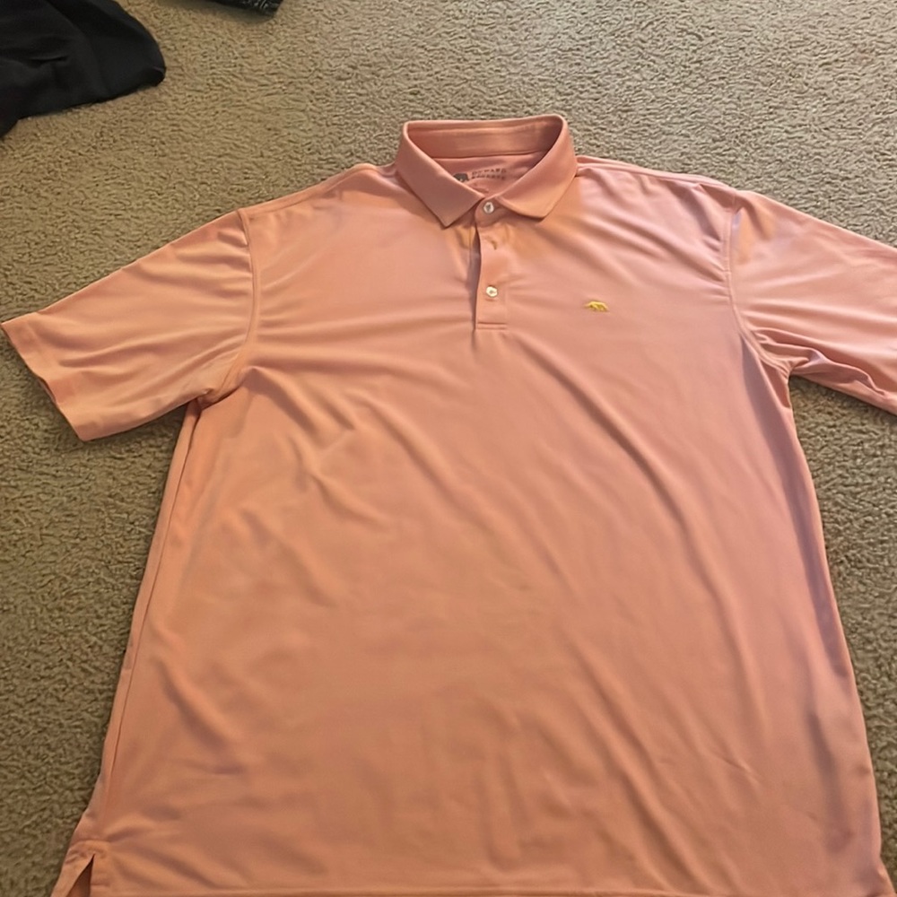 Pink with light orange stripe performance polo onward reserve